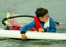 windsurfing in a cagoule